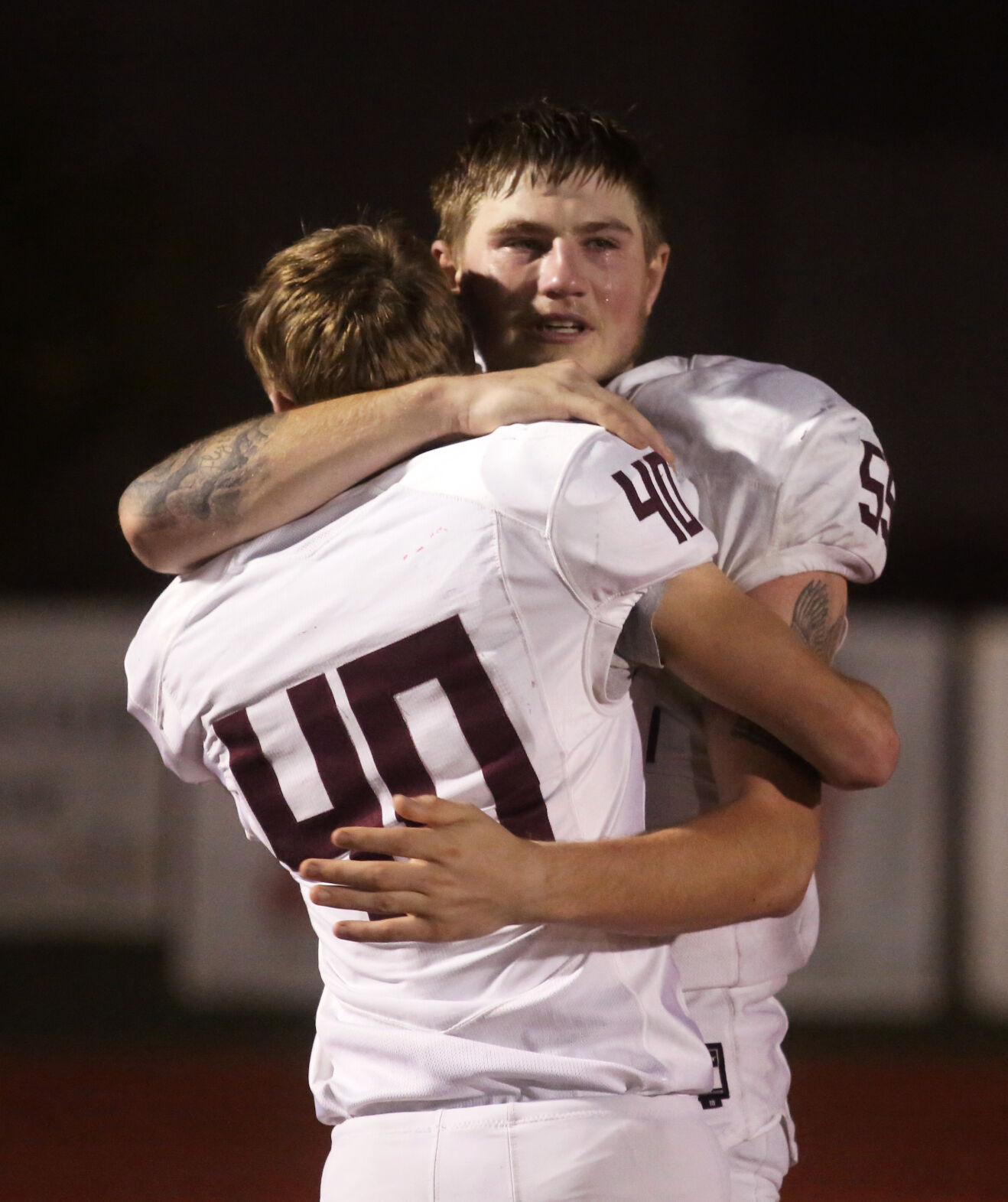 Rolla seniors Payton Lambeth and David Redding embrace after losing
